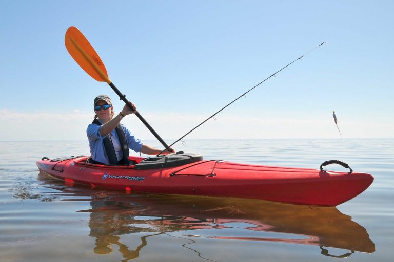 freshwater kayak fishing: fisherman on the water